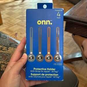 NEW ONN. 4-pack protective holder with strap for Apple AirTag